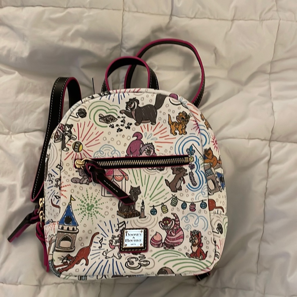New with tags never used Disney World exclusive Dooney &Bourke Backpack cats